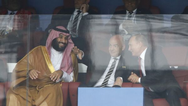 Saudi Arabia Crown Prince Mohammed bin Salman, left, FIFA President Gianni Infantino, center, and Russian President Vladimir Putin watch the match between Russia and Saudi Arabia which opens the 2018 soccer World Cup at the Luzhniki stadium in Moscow, Russia, Thursday, June 14, 2018. - Sputnik International