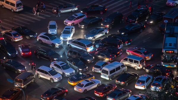 This picture taken on April 16, 2018 shows a traffic jam at a crossroad in the city centre of Beijing - Sputnik International