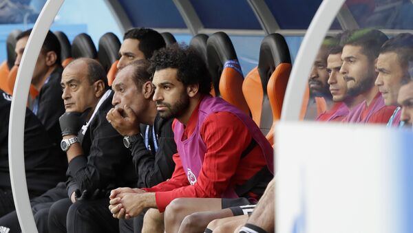 Egypt's Mohamed Salah, center, watches his team during the group A match between Egypt and Uruguay at the 2018 soccer World Cup in the Yekaterinburg Arena in Yekaterinburg, Russia, Friday, June 15, 2018 - Sputnik International