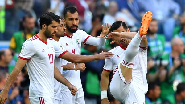 Soccer Football - World Cup - Group B - Morocco vs Iran - Saint Petersburg Stadium, Saint Petersburg, Russia - June 15, 2018 Iran's Karim Ansarifard, Rouzbeh Cheshmi and team mates before the match - Sputnik International
