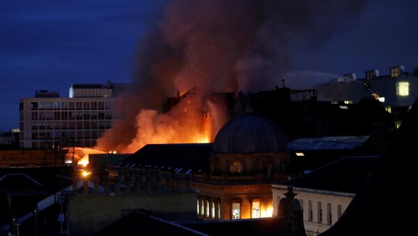 Firefighters attend to a blaze at the Mackintosh Building at the Glasgow School of Art, which is the second time in four years, Glasgow, Scotland, Britain, June 16, 2018 - Sputnik International