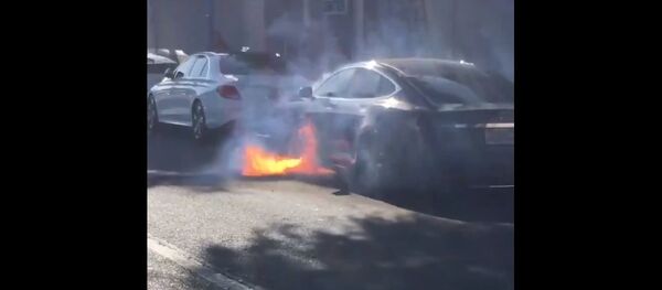 Burning Tesla car - Sputnik International