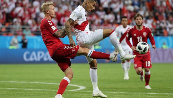 Denmark's Simon Kjaer in action with Peru's Paolo Guerrero, Peru vs Denmark - Mordovia Arena, Saransk, Russia - June 16, 2018 - Sputnik International