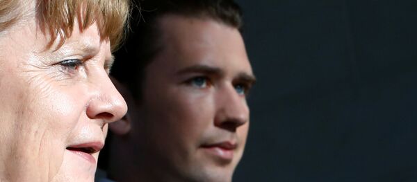 German Chancellor Angela Merkel and Austrian Chancellor Sebastian Kurz arrive at a news conference in the chancellery in Berlin - Sputnik International