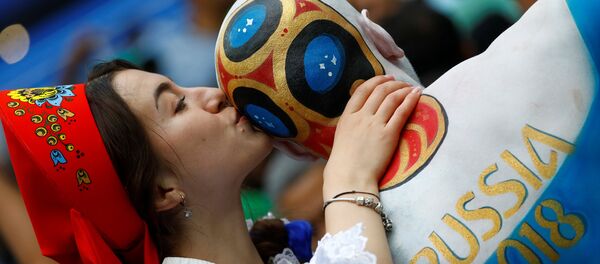 Soccer Football - World Cup - Group A - Russia vs Saudi Arabia - Luzhniki Stadium, Moscow, Russia - June 14, 2018 Russia fan with body paint before the match Soccer Football - World Cup - Group A - Russia vs Saudi Arabia - Luzhniki Stadium, Moscow, Russia - June 14, 2018 Russia fan with body paint before the match - Sputnik International