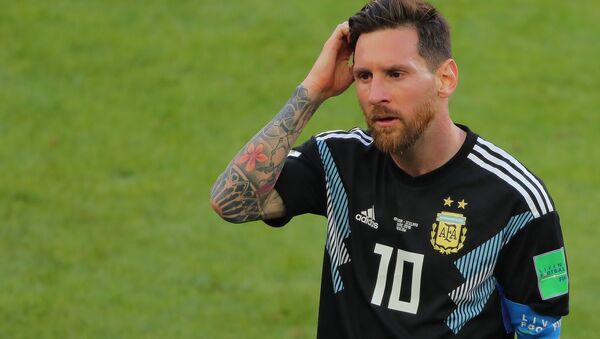Dejected Argentina's Lionel Messi reacts leaving a pitch after the 1-1 draw at World Cup Group D soccer match between Argentina and Iceland at the Spartak stadium in Moscow, Russia, June 16, 2018 - Sputnik International