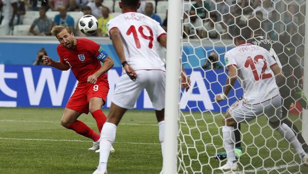 England's Harry Kane scores his side's 2nd goal against Tunisia during a group G match at the 2018 soccer World Cup in the Volgograd Arena in Volgograd, Russia, Monday, June 18, 2018. - Sputnik International