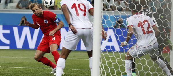 England's Harry Kane scores his side's 2nd goal against Tunisia during a group G match at the 2018 soccer World Cup in the Volgograd Arena in Volgograd, Russia, Monday, June 18, 2018. England's Harry Kane scores his side's 2nd goal against Tunisia during a group G match at the 2018 soccer World Cup in the Volgograd Arena in Volgograd, Russia, Monday, June 18, 2018. - Sputnik International