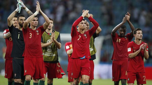 Portugal players applaud their fans after their first World Cup game against Spain on Friday, June 15 - Sputnik International