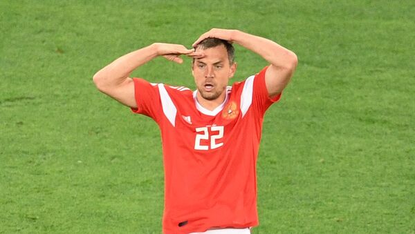 Russia's Artyom Dzyuba celebrates team's third goal during the World Cup Group A soccer match between Russia and Egypt at the St. Petersburg Arena in St. Petersburg, Russia, June 19, 2018 - Sputnik International