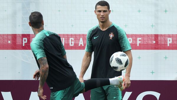 Portugal's Cristiano Ronaldo and Ricardo Quaresma during official training on the eve of the group B match between Portugal and Morocco at the 2018 soccer World Cup, in Kratovo, outskirts Moscow, Russia, Tuesday, June 19, 2018 - Sputnik International