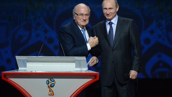 July 25, 2015. Russian President Vladimir Putin (right) and FIFA President Sepp Blatter during the FIFA 2018 World Cup Preliminary Draw (File) - Sputnik International