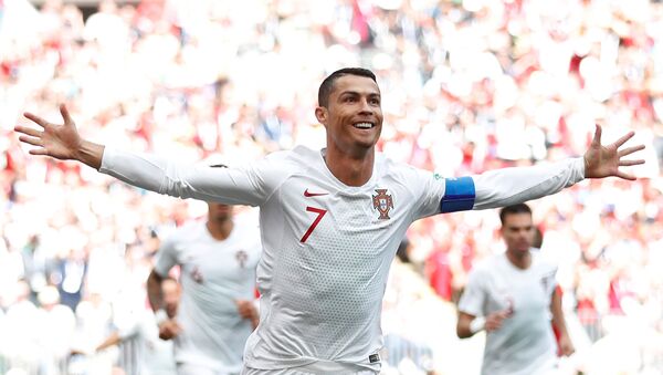 Soccer Football - World Cup - Group B - Portugal vs Morocco - Luzhniki Stadium, Moscow, Russia - June 20, 2018 Portugal's Cristiano Ronaldo celebrates scoring their first goal - Sputnik International
