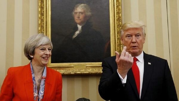 US President Donald Trump gestures as he meets with British Prime Minister Theresa May in the Oval Office of the White House in Washington January 27, 2017. - Sputnik International