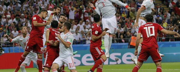 Spain's Gerard Pique, center, jumps for a header during the group B match between Iran and Spain at the 2018 soccer World Cup in the Kazan Arena in Kazan, Russia, Wednesday, June 20, 2018. Spain's Gerard Pique, center, jumps for a header during the group B match between Iran and Spain at the 2018 soccer World Cup in the Kazan Arena in Kazan, Russia, Wednesday, June 20, 2018. - Sputnik International