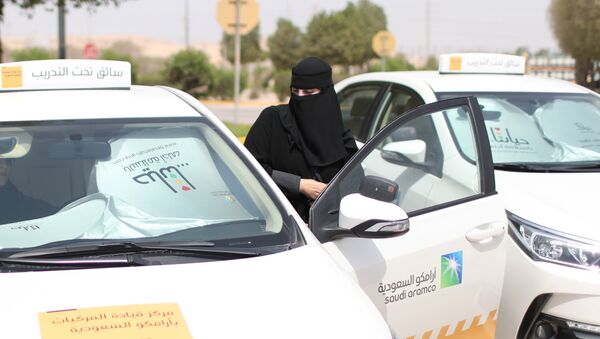 Trainee Amira Abdelgader gets into a car for her driving lesson at Saudi Aramco Driving Center in Dhahran, Saudi Arabia, June 6, 2018 - Sputnik International