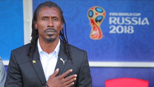 Senegal's head coach Aliou Cisse listens to the national anthem before the World Cup Group H soccer match between Poland and Senegal at the Spartak stadium in Moscow, Russia, June 19, 2018 - Sputnik International