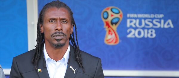 Senegal's head coach Aliou Cisse listens to the national anthem before the World Cup Group H soccer match between Poland and Senegal at the Spartak stadium in Moscow, Russia, June 19, 2018 - Sputnik International