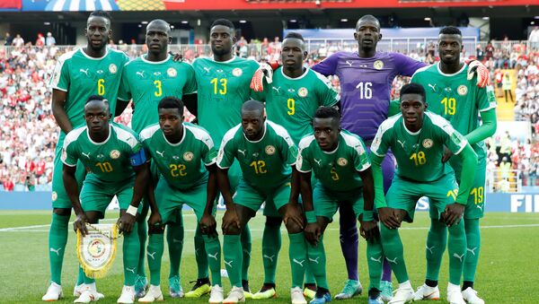 Soccer Football - World Cup - Group H - Poland vs Senegal - Spartak Stadium, Moscow, Russia - June 19, 2018 Senegal players pose for a team group photo before the match - Sputnik International