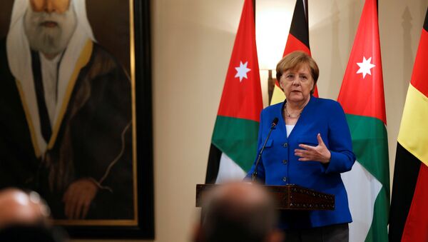 German Chancellor Angela Merkel speaks during a news conference at the Royal Palace in Amman, Jordan June 21, 2018 - Sputnik International
