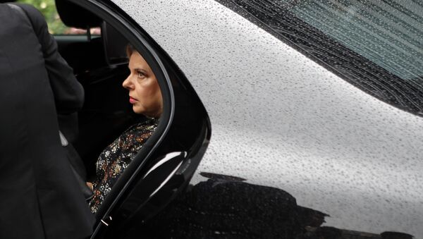 Israel's Prime Minister's wife Sara Netanyahu enters the car with Israel's Prime Minister Benjamin Netanyahu after the meeting with French Finance Minister Bruno Le Maire at Bercy Economy Ministry, in Paris, Wednesday, June 6, 2018 - Sputnik International