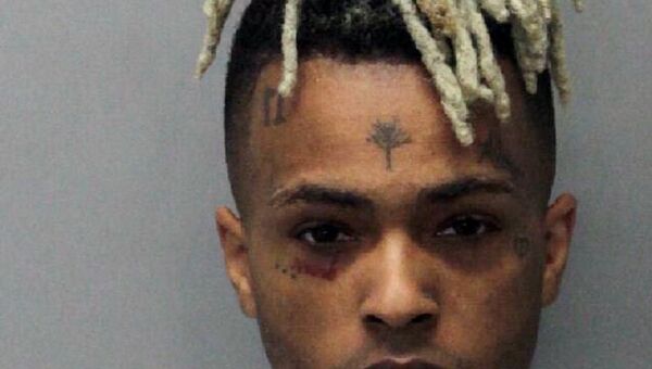 This 2017 arrest photo made available by the Miami Dade Dept. of Corrections shows Jahseh Onfroy, also known as the rapper XXXTentacion, under arrest. Onfroy was shot and killed, Monday, June 18, 2018, in Deerfield Beach, Fla. - Sputnik International