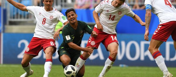 From left: Denmark’s Thomas Delaney, Australia’s Mathew Leckie, Denmark’s Henrik Dalsgaard and Simon Kjaer struggle for a ball during the World Cup Group C soccer match between Denmark and Australia at the Samara Arena, in Samara, Russia, June 21, 2018 - Sputnik International