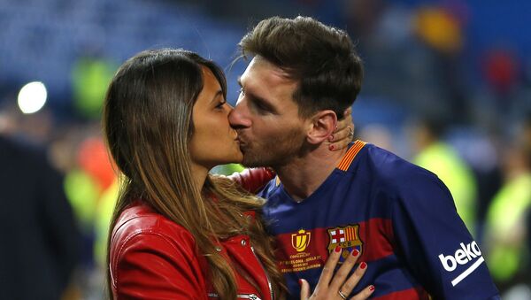In this Sunday, May 22, 2016 file photo, Barcelona's Lionel Messi kisses his wife Antonella Roccuzzo as they celebrate after winning the final of the Copa del Rey soccer match between FC Barcelona and Sevilla FC at the Vicente Calderon stadium in Madrid - Sputnik International