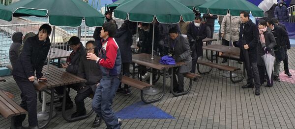 (File) Participants are guided during an evacuation drill simulating a North Korea ballistic missile attack in Tokyo, Monday, Jan. 22, 2018 (File) Participants are guided during an evacuation drill simulating a North Korea ballistic missile attack in Tokyo, Monday, Jan. 22, 2018 - Sputnik International
