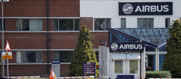 A security guard stands at the entrance to Airbus' wing assembly plant at Broughton, near Chester, Britain, June 22, 2018 A security guard stands at the entrance to Airbus' wing assembly plant at Broughton, near Chester, Britain, June 22, 2018 - Sputnik International