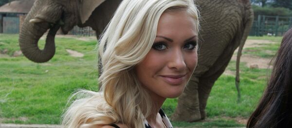 (File) Miss World participant Miss Iceland, Alexandra Helga Ivarsdottir stands in front of a elephant during a visit to the Zoo, inJohannesburg, South Africa, Saturday, Dec. 6, 2008 (File) Miss World participant Miss Iceland, Alexandra Helga Ivarsdottir stands in front of a elephant during a visit to the Zoo, inJohannesburg, South Africa, Saturday, Dec. 6, 2008 - Sputnik International