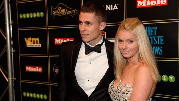 (File) Belgian football Essevee's Thorgan Hazard and his girlfriend Marie pose on the red carpet as they arrive for the 60th edition of the 'Golden Shoe' award ceremony on January 22, 2014 in Lint - Sputnik International