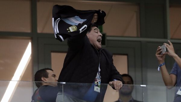 Argentina's former soccer star Diego Maradona cheers for his team before the group D match between Argentina and Croatia at the 2018 soccer World Cup in Nizhny Novgorod Stadium in Nizhny Novgorod, Russia, Thursday, June 21, 2018 - Sputnik International
