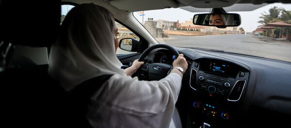 Dr Samira al-Ghamdi, 47, a practicing psychologist, drives around the side roads of a neighborhood as she prepares to hit the road on Sunday as a licensed driver, in Jeddah, Saudi Arabia June 21, 2018 Dr Samira al-Ghamdi, 47, a practicing psychologist, drives around the side roads of a neighborhood as she prepares to hit the road on Sunday as a licensed driver, in Jeddah, Saudi Arabia June 21, 2018 - Sputnik International
