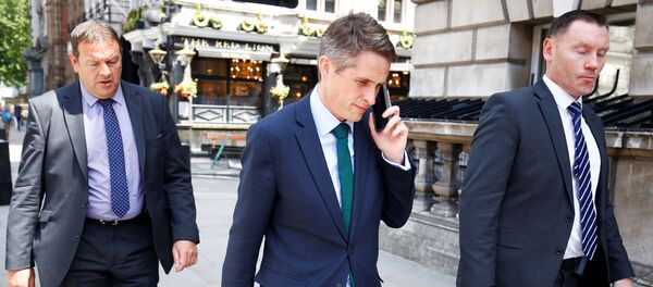 Britain's Secretary of State for Defence Gavin Williamson walks down Whitehall in Westminster, London, June 6, 2018 - Sputnik International