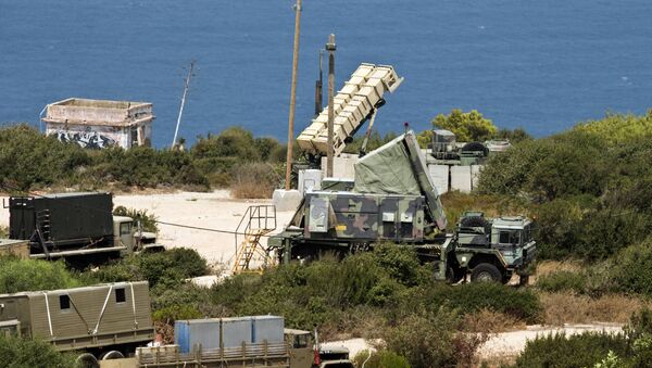 (File) A Patriot surface-to-air missile battery is positioned in the Mediterranean coastal city of Haifa north of Israel on August 29, 2013 - Sputnik International