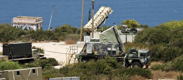(File) A Patriot surface-to-air missile battery is positioned in the Mediterranean coastal city of Haifa north of Israel on August 29, 2013 - Sputnik International
