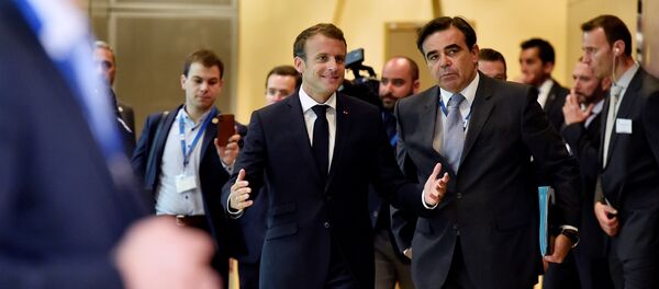 French President Emmanuel Macron arrives to take part in an emergency European Union leaders summit on immigration, in Brussels, Belgium June 24, 2018 - Sputnik International