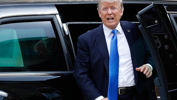 US President Donald Trump gets out of the car - Sputnik International