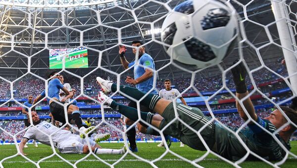 Soccer Football - World Cup - Group A - Uruguay vs Russia - Samara Arena, Samara, Russia - June 25, 2018 Uruguay's Edinson Cavani scores their third goal - Sputnik International