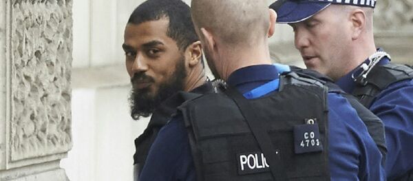 Khalid Ali being arrested by armed police in Whitehall in April 2017 Khalid Ali being arrested by armed police in Whitehall in April 2017 - Sputnik International