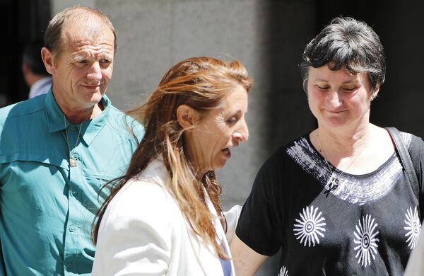 Sophie Lionnet's parents Patrick (left) and Catherine (right) leaving the Old Bailey on June 26, 2018 with another relative - Sputnik International
