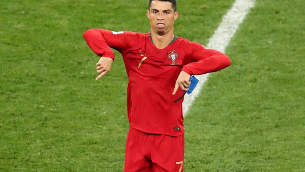 Soccer Football - World Cup - Group B - Iran vs Portugal - Mordovia Arena, Saransk, Russia - June 25, 2018 Portugal's Cristiano Ronaldo reacts after the match referencing - Sputnik International