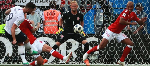 Soccer Football - World Cup - Group C - Denmark vs France - Luzhniki Stadium, Moscow, Russia - June 26, 2018 France's Olivier Giroud has a shot at goal - Sputnik International