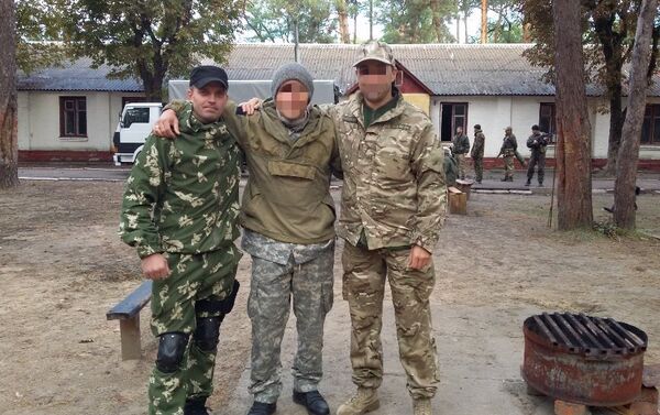 Training ground of military unit 3066 'Kulchitsky's Battalion'. Sergei Sanovsky pictured left. - Sputnik International