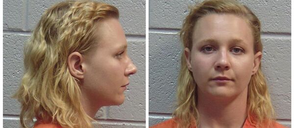 Combination photo showing Reality Winner, the US intelligence contractor who pled guilty to leaking classified National Security Agency material is seen in these undated booking photos in Lincolnton, Georgia. - Sputnik International