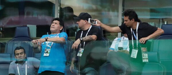 Soccer Football - World Cup - Group D - Nigeria vs Argentina - Saint Petersburg Stadium, Saint Petersburg, Russia - June 26, 2018 Diego Maradona during the match Soccer Football - World Cup - Group D - Nigeria vs Argentina - Saint Petersburg Stadium, Saint Petersburg, Russia - June 26, 2018 Diego Maradona during the match - Sputnik International