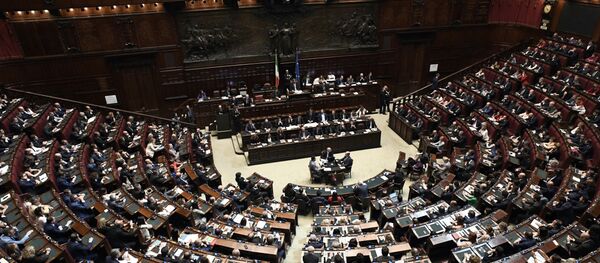 Italian premier Giuseppe Conte (C) speaks at the Lower House, ahead of a confidence vote on the government program, in Rome (File) Italian premier Giuseppe Conte (C) speaks at the Lower House, ahead of a confidence vote on the government program, in Rome (File) - Sputnik International