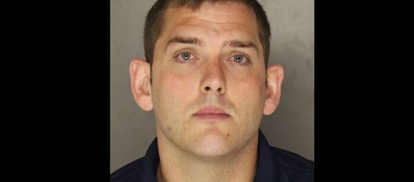 Pittsburgh police officer Michael Rosfeld has been charged with homicide for the killing of unarmed 17-year-old Antwon Rose II on June 19. - Sputnik International