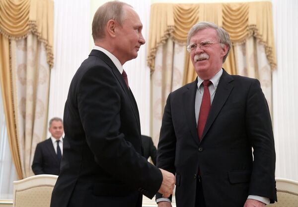 June 27, 2018. Russian President Vladimir Putin and Assistant to the US President for National Security Affairs John Bolton, right, during a meeting in the Kremlin - Sputnik International